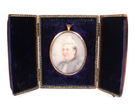 A Victorian portrait miniature of a lady, watercolour on ivory, painted with a bust-length portrait of a lady wearing a laced