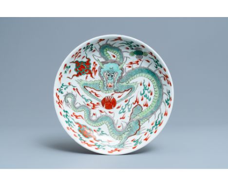 Full title: A Chinese famille verte 'dragon' dish, KangxiDescription: Dia.: 33,5 cmÊ Condition: (UV-checked)- The soft paste 
