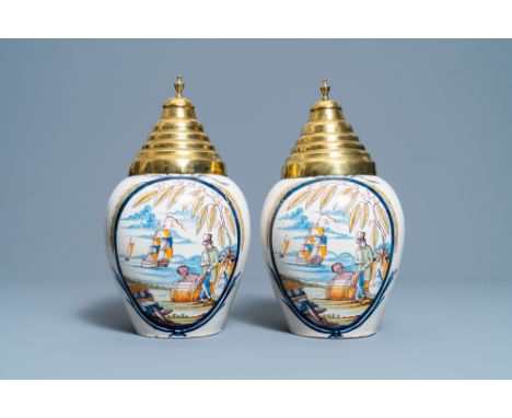 Full title: A pair of polychrome Dutch Delft tobacco jars with a merchant and a slave, late 18th C.Description: H.: 23,5 cm (