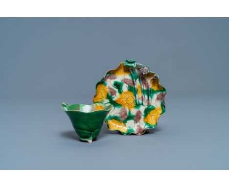 Full title: A Chinese 'egg and spinach'-glazed lotus cup and saucer with applied design, KangxiDescription: Dia.: 13,5 cm (th