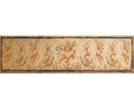 Full title: A Chinese gold-thread embroidered silk 'dragon' panel, 19th C.Description: Dim.: 111 x 40 cm (the frame)Dim.: 95 