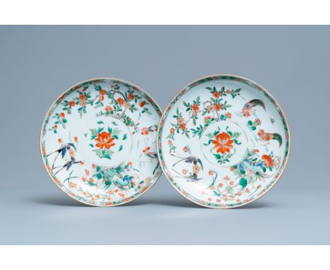 Full title: A pair of Chinese famille verte dishes, KangxiDescription: Dia.: 28 cmÊ Condition: (UV-checked)- One with three h