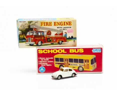 A Swallow Toys (Japan) Tinplate Friction Fire Engine, Alps plastic battery-operated School Bus, in original boxes, loose Schu