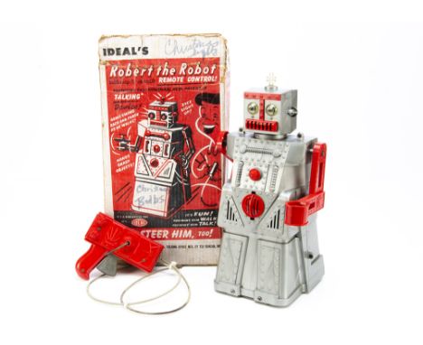 Ideal Toys Remote Control Robert The Robot, 1950's, silver plastic body, red arms, rear crank handle, remote control, in orig