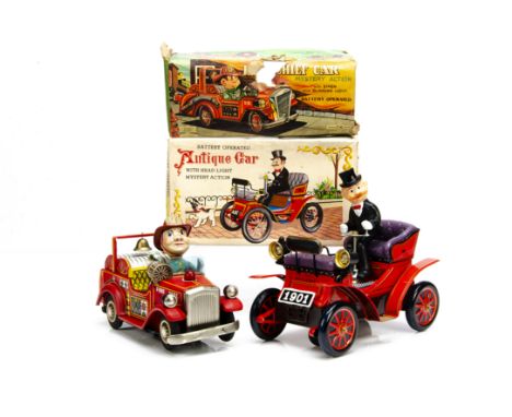 Nomura (T N Japan) Tinplate Battery-Operated Fire Chief Car, novelty Fire Engine in red with Fireman figure cranking siren, w