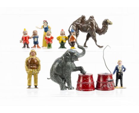 A selection of lead figures by Britains and Charbens consisting of Britains Snow White and 5 Dwarves,  a camel and RNLI Lifeb