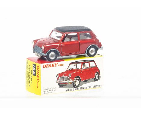 A Dinky Toys 183 Morris Mini Minor, metallic red body, matt black roof, white interior, spun hubs, in original box, E, box VG