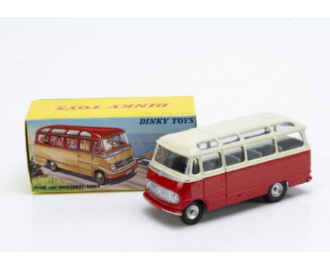 A French Dinky Toys 541 Mercedes-Benz Autocar (Small Bus), red lower body, off-white upper, grey interior, concave hubs, in o