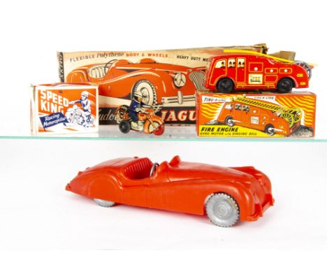 Ex-Shop Stock, large scale Tudor Rose Jaguar XK140 in red polythene with friction drive motor, Wells-Brimtoy No 146 Gyro Moto