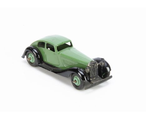 A Dinky Toys 36d Rover Streamlined Saloon, green body, black moulded chassis, light green ridged hubs, VG