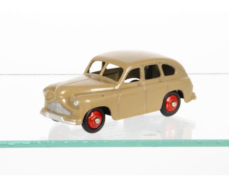 A Dinky Toys 40e Standard Vanguard, fawn body, open rear wheel arches, red hubs, small baseplate lettering, rear axle secured
