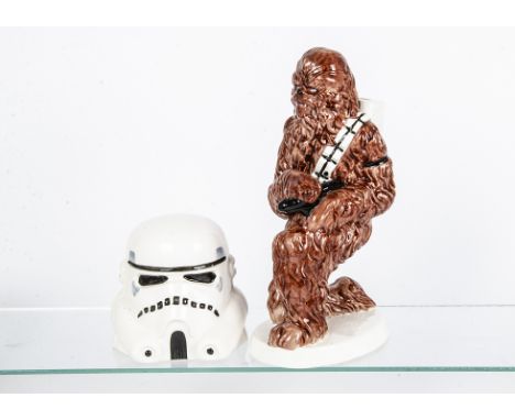 A 1980s Sigma (Japan) Ceramic Stormtrooper Lidded Pot, with Sigma Chewbacca figural Moneybox complete with black rubber stopp