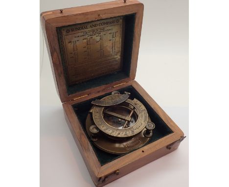 Boxed brass sundial compass marked JH Steward