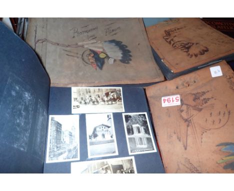 Three albums of vintage black and white photographs 