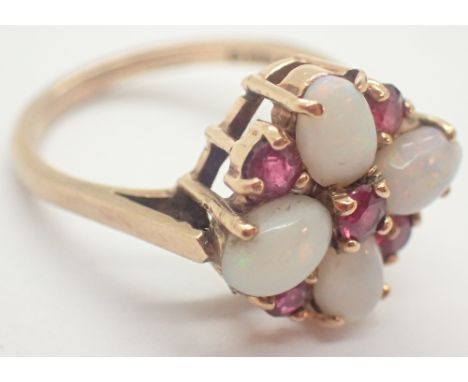 9ct gold opal and ruby cluster ring size M  CONDITION REPORT: Approximately 15mm spread. No apparent damages. 