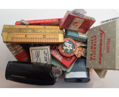 Box of mixed collectables including lighters vintage razor blades etc