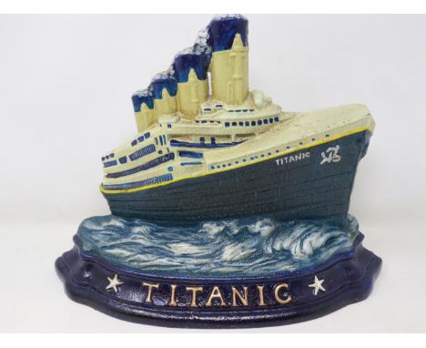 Painted cast iron Titanic doorstop, H: 25 cm. UK P&amp;P Group 3 (£30+VAT for the first lot and £8+VAT for subsequent lots) 