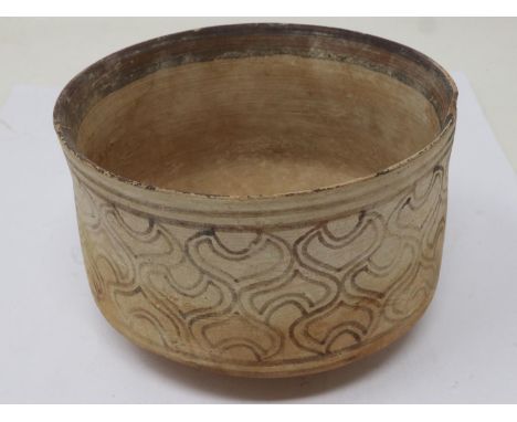 Indus Valley Neolithic period footed bowl, D: 10 cm, damages to the rim and discolouration throughout the body, most of the d