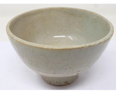 Ming Dynasty celadon glazed bowl, footed, D: 13 cm, losses to rim. UK P&amp;P Group 1 (£16+VAT for the first lot and £2+VAT f