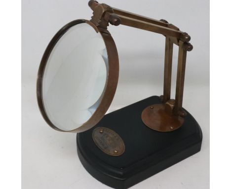 Brass magnifying glass on wooden base. UK P&amp;P Group 2 (£20+VAT for the first lot and £4+VAT for subsequent lots) 
