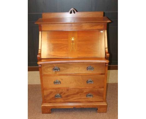 MAHOGANY BUREAU OF ART NOUVEAU DESIGN
the sliding fall front inlaid with stylised flowerhead with pull out writing surface be