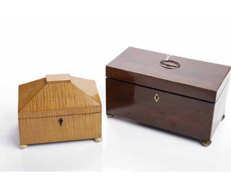 19TH CENTURY MAHOGANY TEA CADDY
of rectangular form on four brass ball feet, later oval brass handle fitted to the top, inter