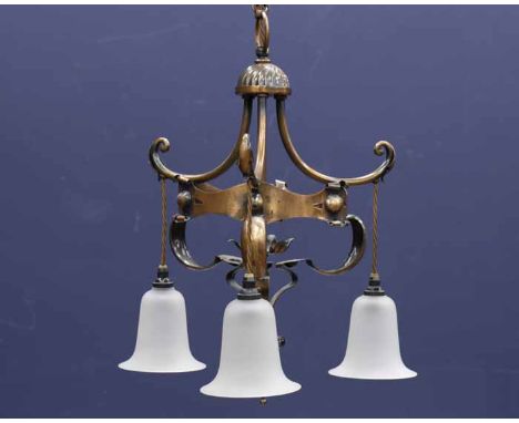 ARTS AND CRAFTS HAMMERED OXIDISED COPPER THREE LIGHT CEILING PENDANT
with frosted glass shades, 57cm high, 36cm wide