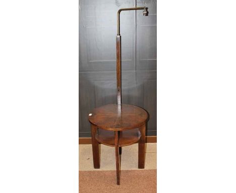 ART DECO WALNUT CIRCULAR OCCASIONAL TABLE WITH ATTACHED READING LIGHT
on four tapering square legs, rotating brass light fitt