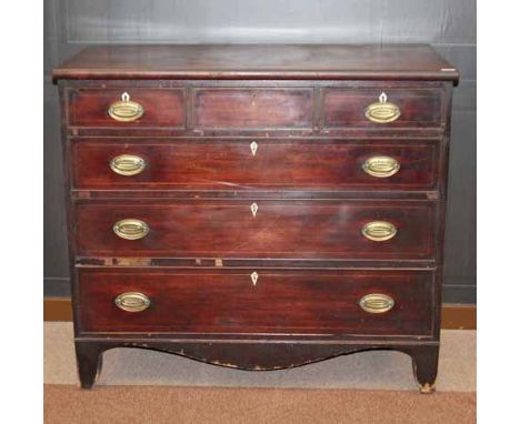 REGENCY MAHOGANY OBLONG CHEST
of three short and three long graduated cockbeaded drawers, outlined with boxwood stringing, on
