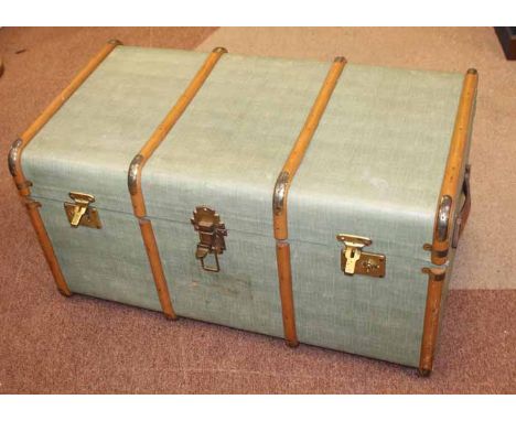 VINTAGE CABIN TRUNK
in green waxed canvas with hinged cover, 93cm long, 38cm wide 