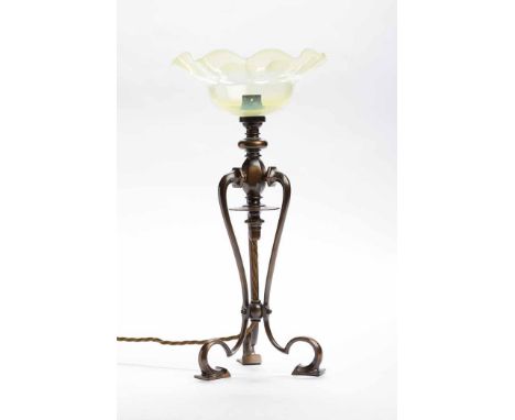 EARLY 20TH CENTURY COPPER TABLE LAMP
form of three scrolling supports, with fluted vaseline glass shade, 39cm high; together 