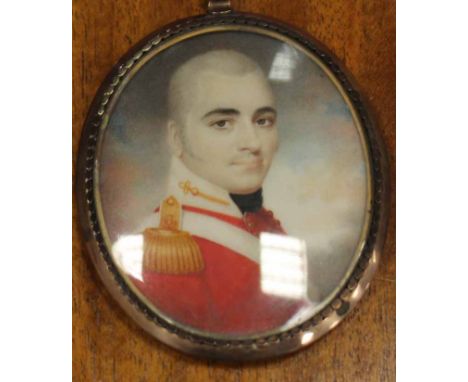 19TH CENTURY OVAL PORTRAIT MINIATURE OF AN OFFICER
likely painted on card, sitter a grey haired man in uniform, the badge acr