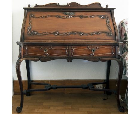 EDWARDIAN MAHOGANY BUREAU DE DAME OF FRENCH DESIGN 
the shaped and scroll moulded fall front writing surface enclosing a fitt