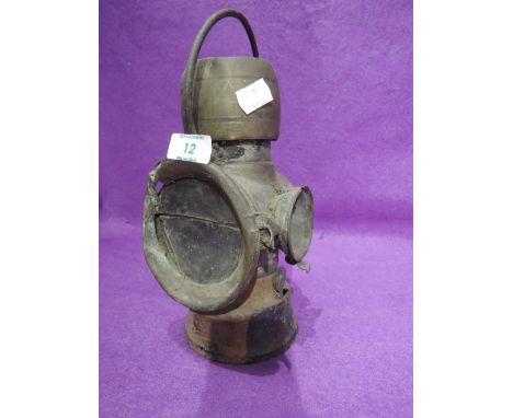 A vintage car head lamp by King of The Road Lucas no. 632