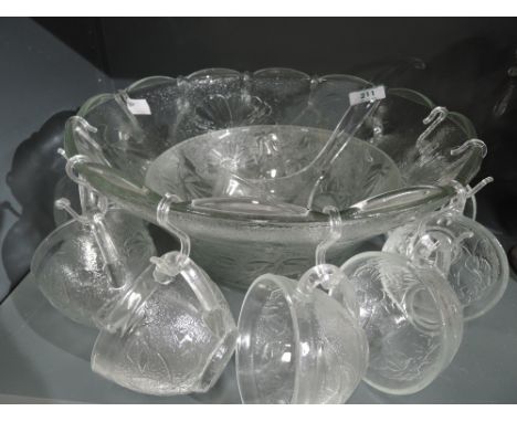 A vintage punch bowl and glass set ideal for partys