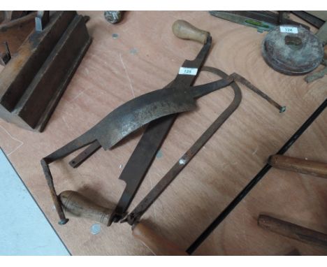 Two vintage draw knifes one with unusual curved blade and deep set fret saw