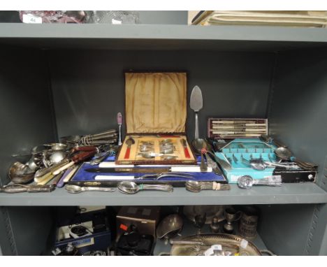 A selection of vintage flatware cutlery and table items