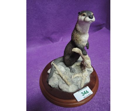 A vintage otter figure