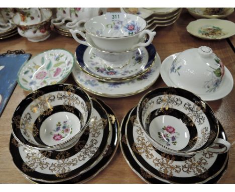 A selection of vintage cabinet cups and saucers