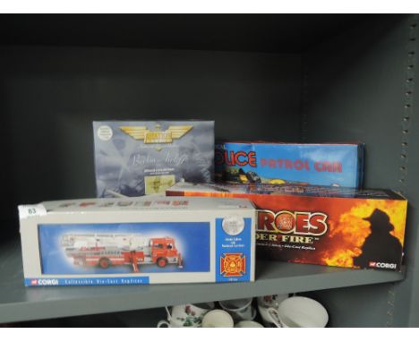 A selection of vintage collectable toy cars and fire engine