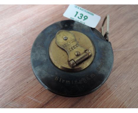 A vintage measure tape by John Rabone & sons No 4351