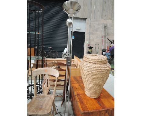 A modern metal standard/reading light