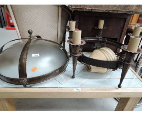 A vintage cast ceiling light fitting and similar opaque glass shade 