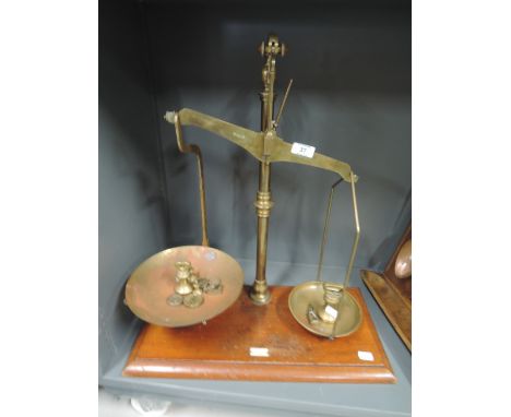 A vintage set of pharmacist or dispensary balance scales with weights marked Class B to weigh 2lb 