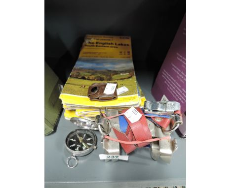 A selection of vintage ordnance survey maps and walking related items