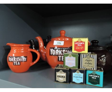 A selection of vintage tea pots including Yorkshire tea