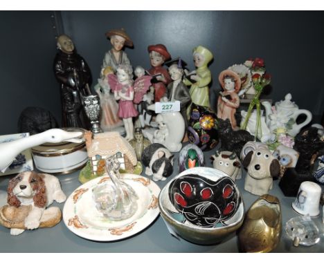 A selection of vintage figures figurines and trinkets