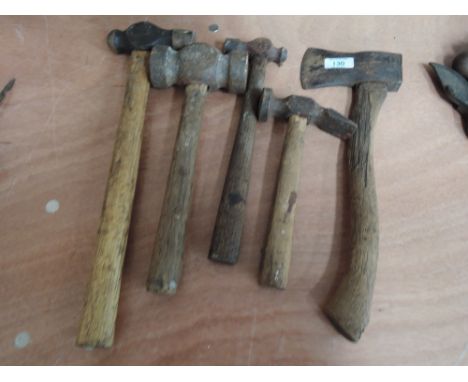 A selection of vintage hammers and axe 