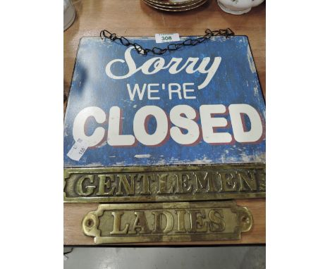 Two vintage brass cast toilet signs