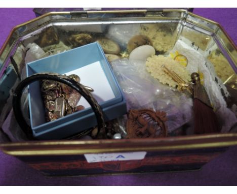 A selection of vintage costume jewellery including broaches cufflinks necklace etc